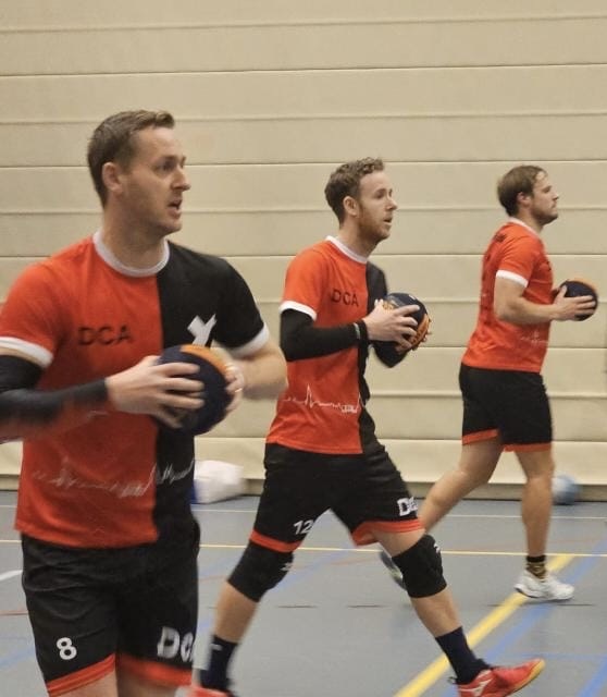 The three founders in action during a dodgeball game